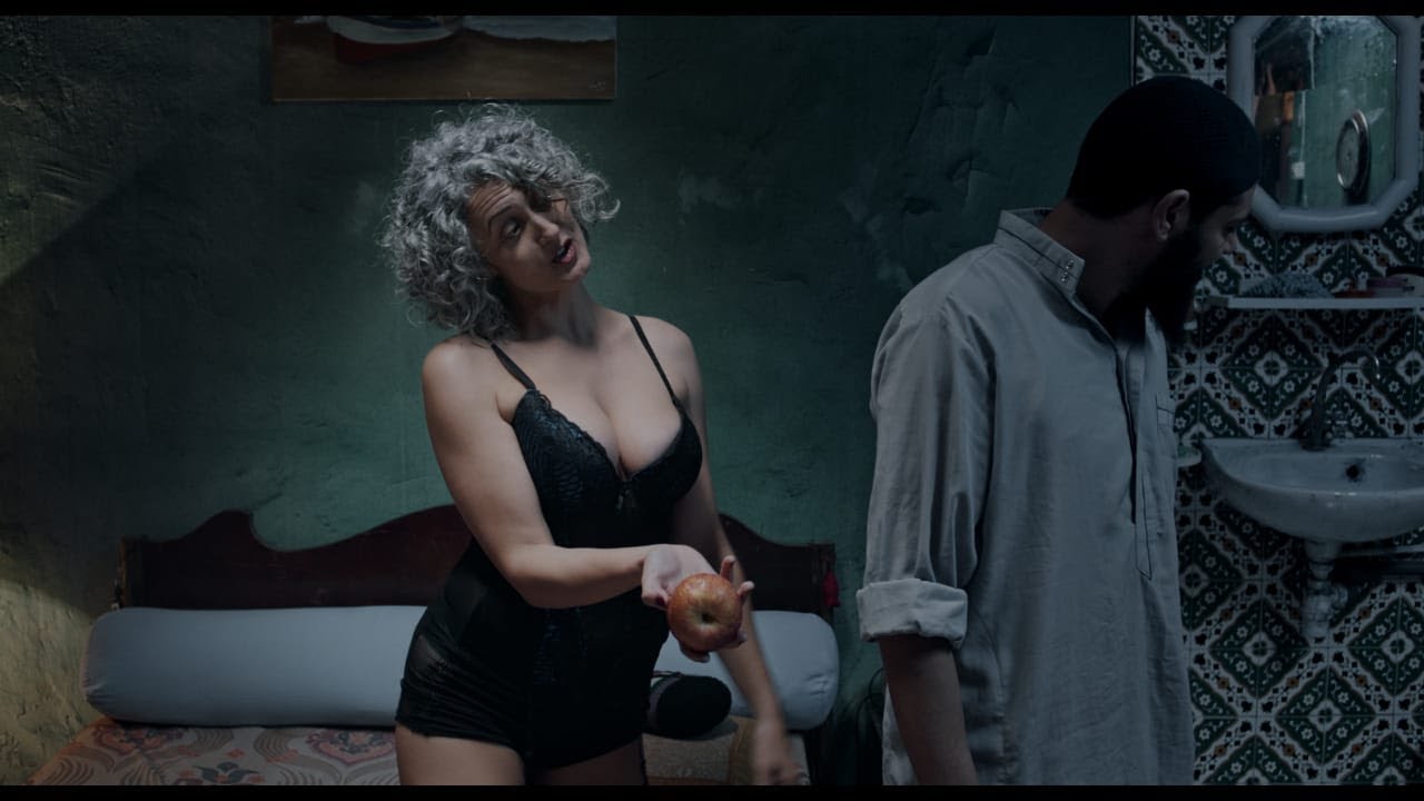 نادية بوستة في فيلم "الهربة" نادية بوستة في فيلم "الهربة"