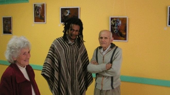 الاديب والفنان السوداني محمد بهنس الراحل احد المعارض الفنيه