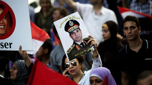 السيسي يعلن الترشح للرئاسة والاخوان يؤكدون انه " لااستقرار ولا امن " معه