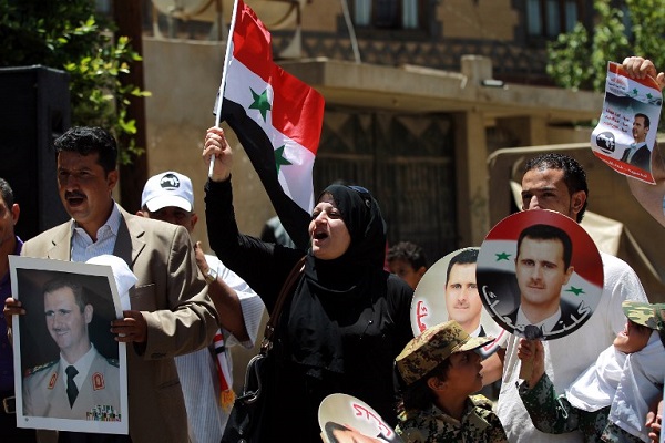 السوريون يصوتون لرئيسهم في الخارج واكثر من 40 قتيلا في قصف حلب