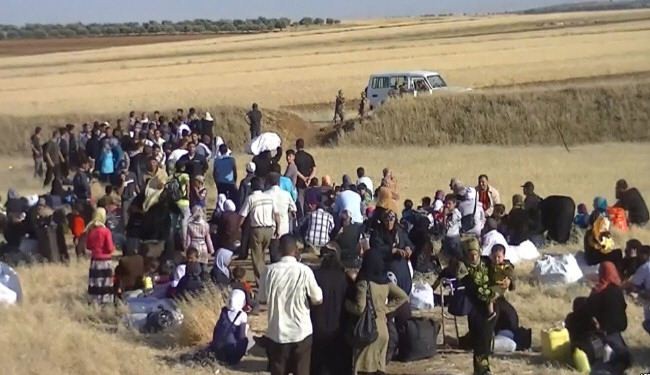 مئات اللاجئين السوريين يغادرون مدينة غازي عنتاب التركية بعد اشتباكات مع السكان