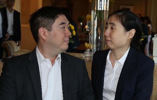 الزوجان ماثيو وغريس هوانغ في الدوحة في 19 تشرين الاول/اكتوبر 2014