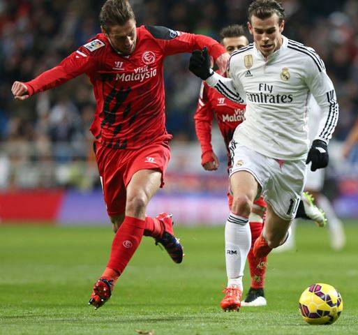 أتلتيكو يفلت بنقطة من كمين إشبيلية بمهرجان للبطاقات الصفراء بالدوري الإسباني