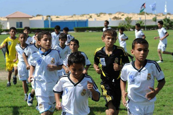 مخيم فلسطيني يستفيد من خبرات "ريال مدريد"  في التدريب  