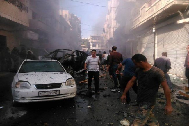  قتلى وجرحى في تفجيرين بدراجتين ناريتين في حي علوي بحمص
