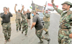 عراقيون يحتفلون بتحرير الساحل الأيسر بالموصل