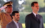 الاسد ونجاد يردان على كلينتون بتوقيع اتفاق يلغي تأشيرات الدخول بين البلدين
