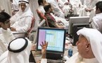 سوق الكويت للاوراق المالية توقف التداول باسهم 24 شركة مدرجة