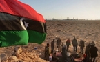 فرنسا تعترف بالمجلس الوطني ممثلا لليبيا وقوات القذافي تستعيد مدينة الزاوية