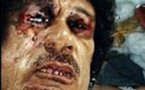 مصورالفرنسية ألتقط اول صورة للقذافي مضرجا بدمه