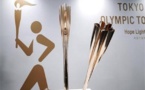 اليابان تستقبل الشعلة الأولمبية باحتفالية مبسطة و حالة من الضبابية  