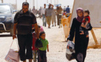 سوريون عائدون الى حلب يحاولون استعادة حياتهم الطبيعية وسط الحرب والدمار