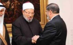 مرسي شكا دولا خليجية لقيادات إسلامية والقرضاوي طالبه بالتدخل بقوة في سورية