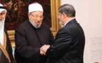 القرضاوي يصدر فتوى بوجوب تأييد مرسي وطاعته داعياً السيسي للتراجع