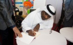 الحظ الكويتي يوقع  كتابة " يقول المتوصف " مستعيدا الحكم والامثال في معرض " العين تقرأ " بالامارات 