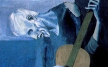 "عازف الغيتار".. الموسيقى كأداة لمواجهة بؤس الحياة ميدان - بيكاسو